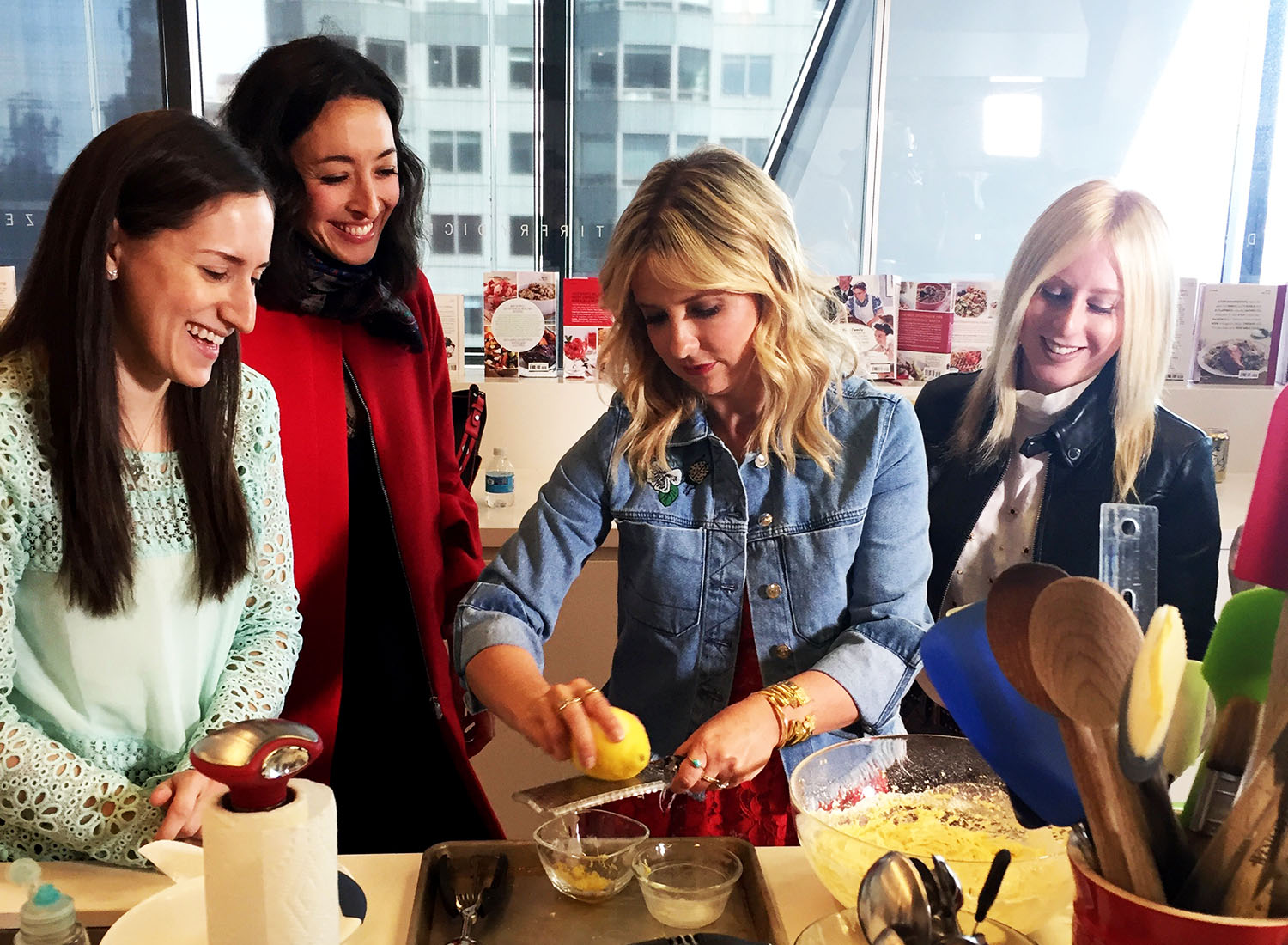 Sarah Michelle Gellar zests a lemon.